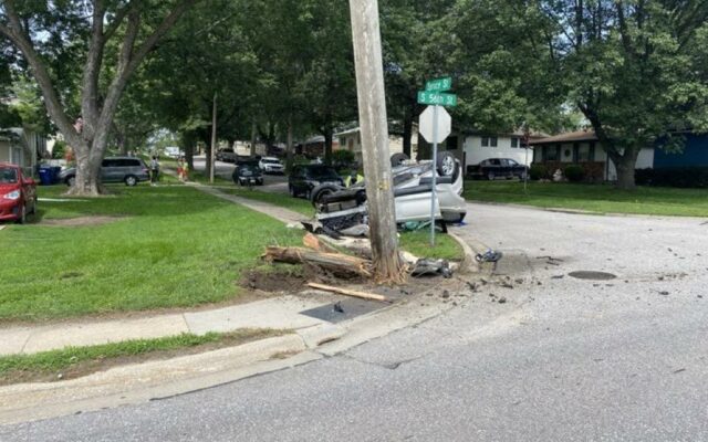 Part of 56th Street Is Closed After Car Hits Pole